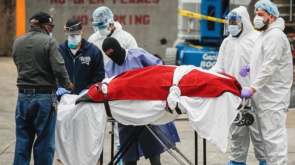 america coronavirus cases covid 19 vaccine corona deaths | अमेरिका में डरा रहे कोरोना से मौत के आंकड़े, शवों की हुई ऐसी हालत