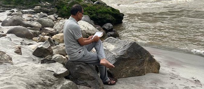 Shivraj is searching for moments of peace in Devbhoomi, writing Ram's name on the banks of Ganga.
